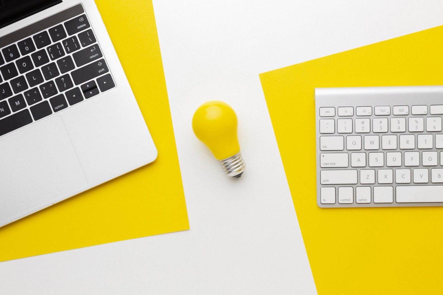 A light bulb and computer - generating ideas.
