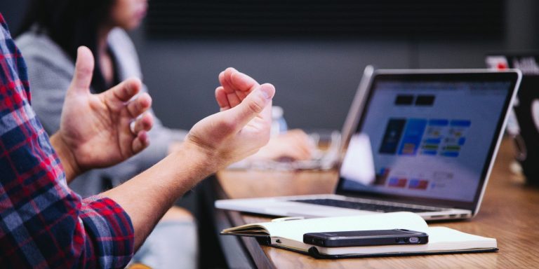 Frustrated person in front of a website
